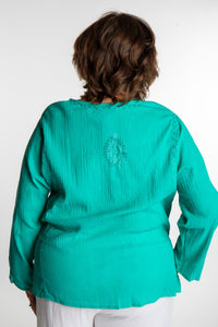 Betty is wearing a size L Turquoise embroidered Kurta top