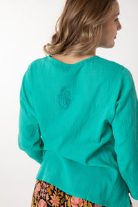 Jacalyn is wearing size S cotton kurta in turquoise
