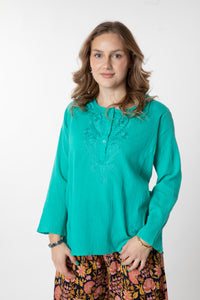 Jacalyn is wearing size S cotton kurta in turquoise