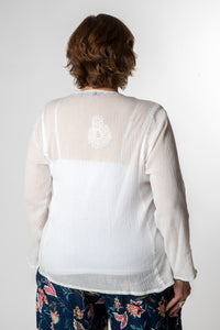 Betty is wearing size M cotton kurta in white