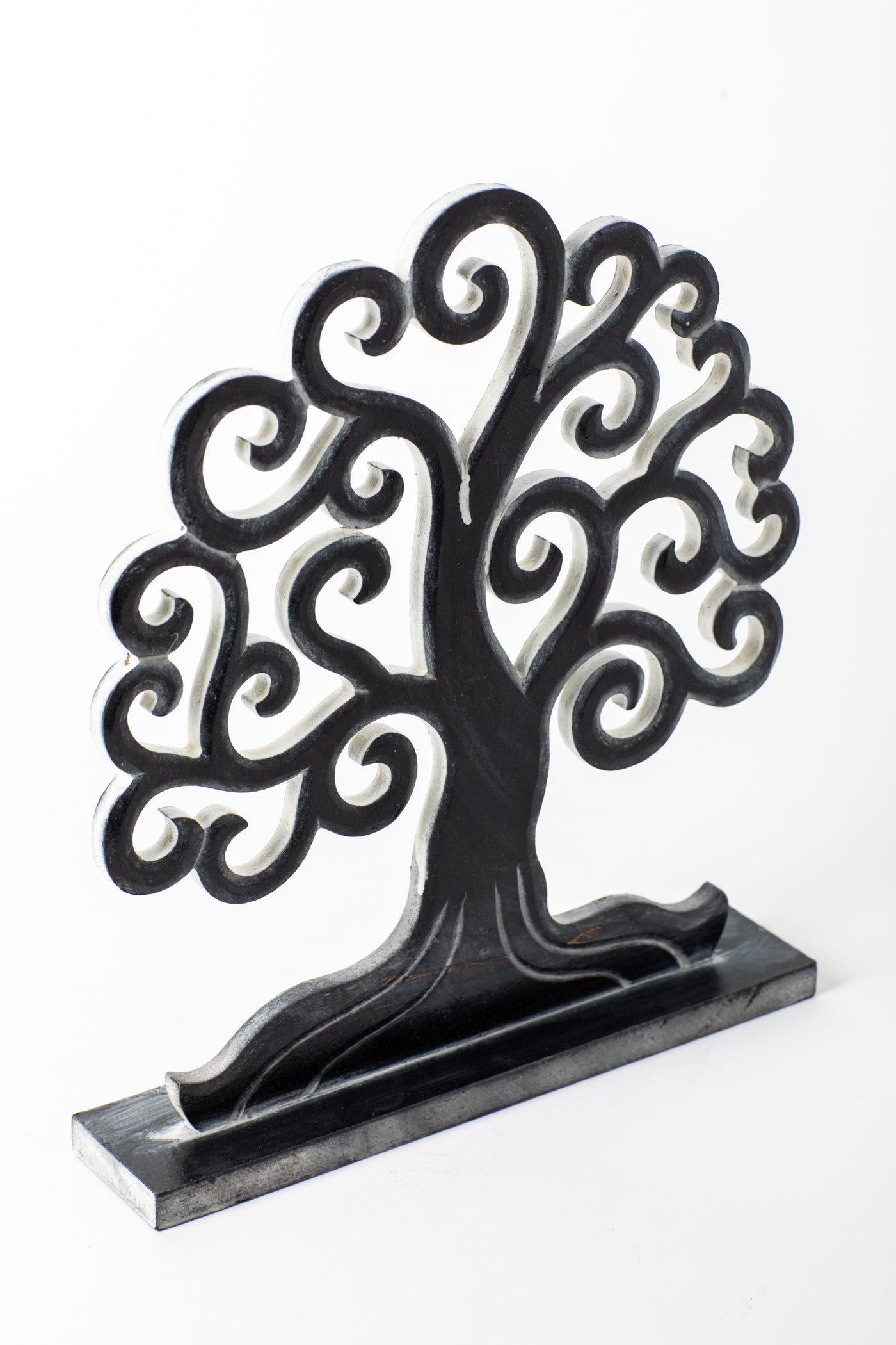 Wooden tree of life sculpture in black