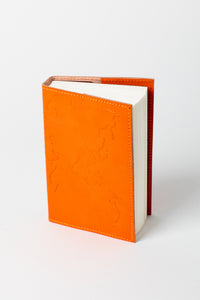 orange world map embossed leather journal