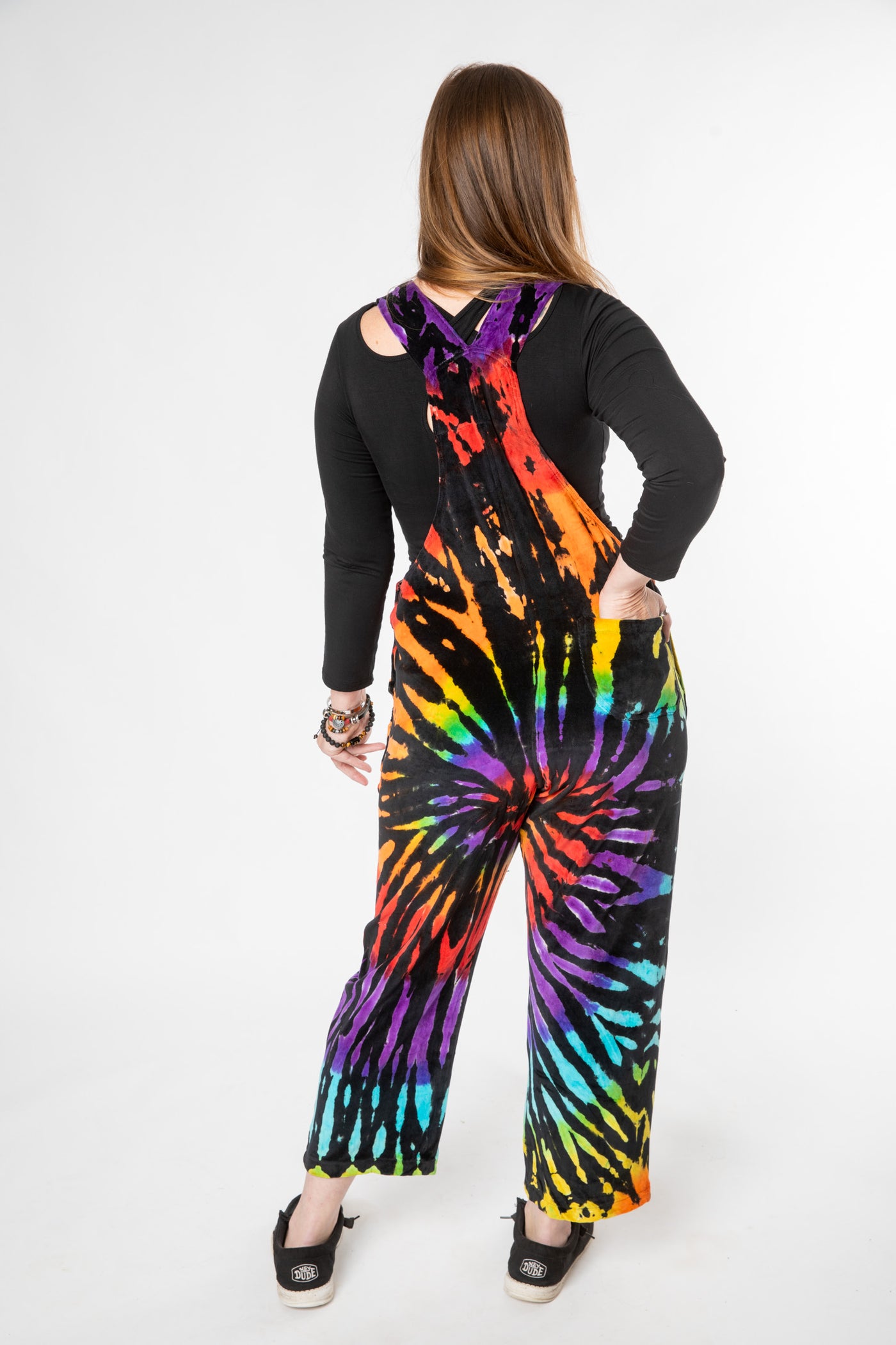 Margaret is wearing size M velour tie dye overalls