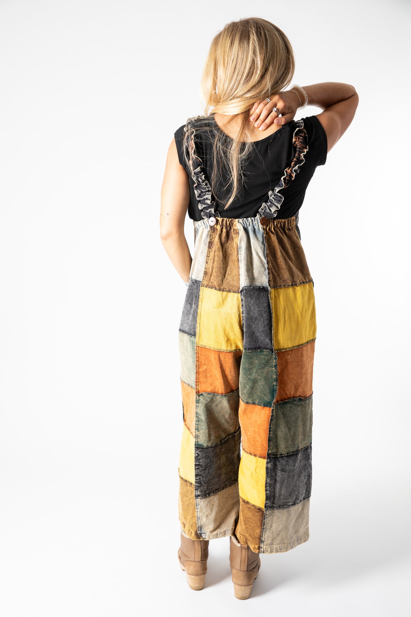 Sophie is wearing size S/M patchwork corduroy jumper in natural