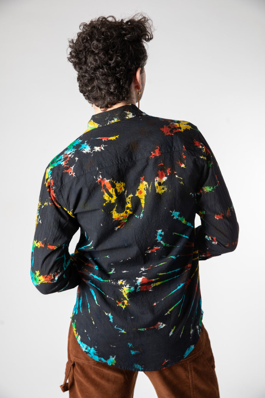 Dimitri is wearing size L tie dye button up shirt in black