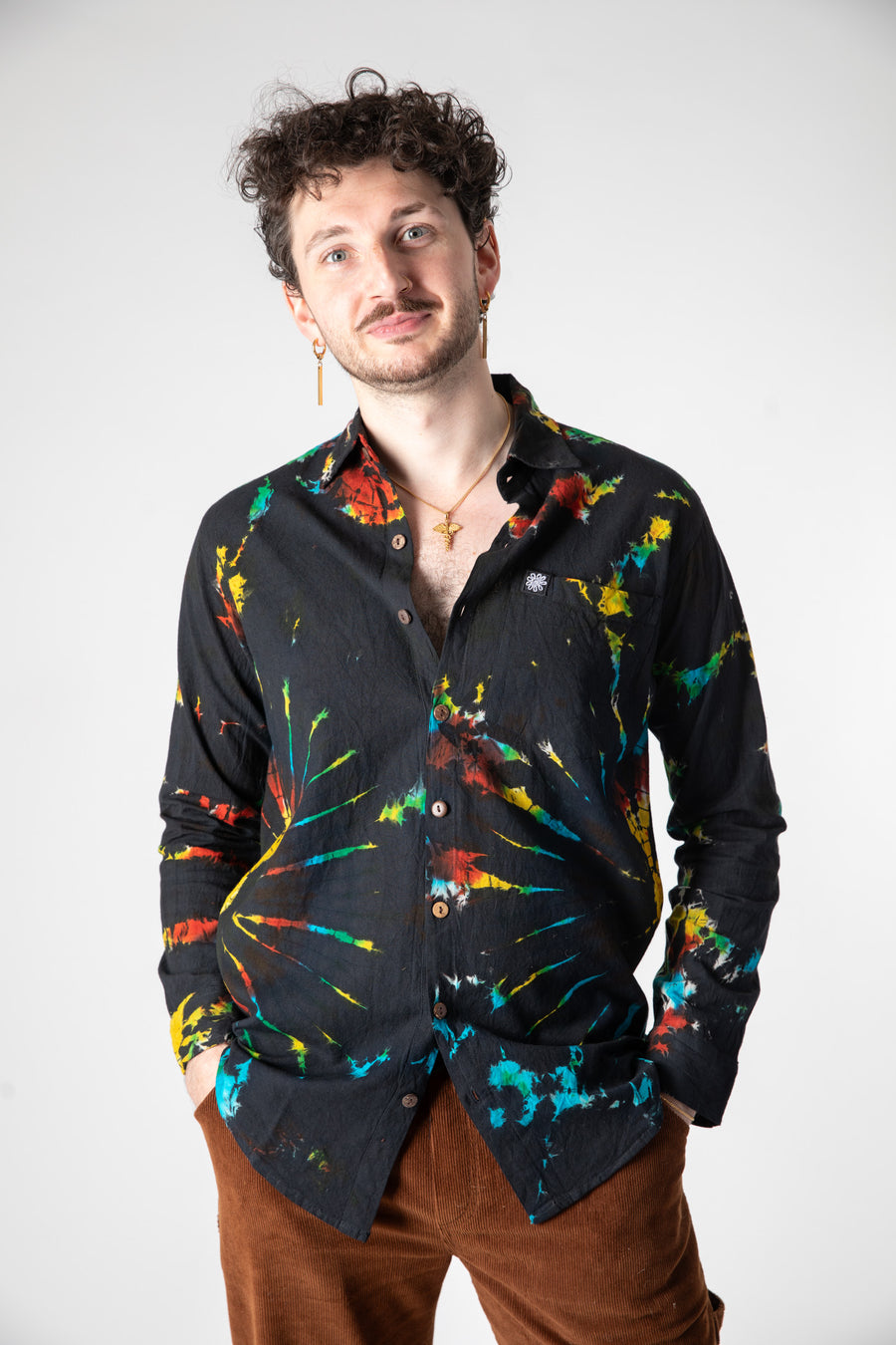 Dimitri is wearing size L tie dye button up shirt in black