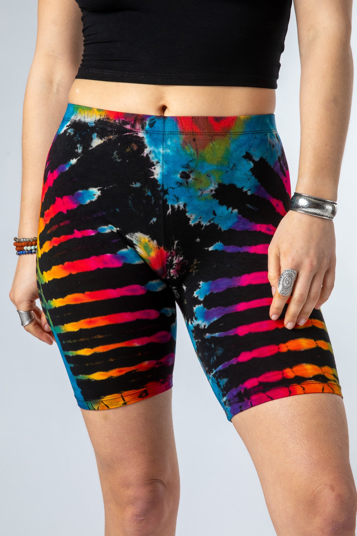 Sophie is wearing size S/M tie dye bike shorts in black rainbow 