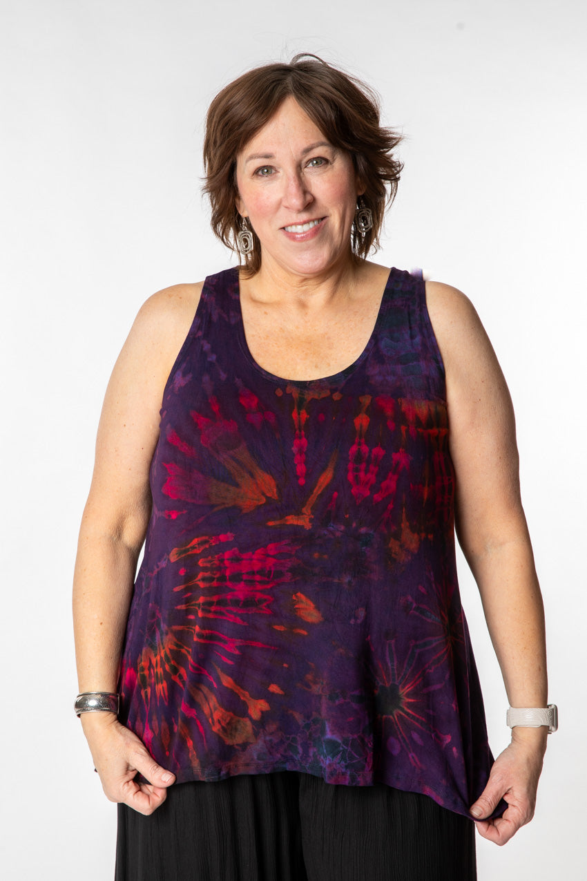 Betty is wearing a tie dye tank top in eggplant