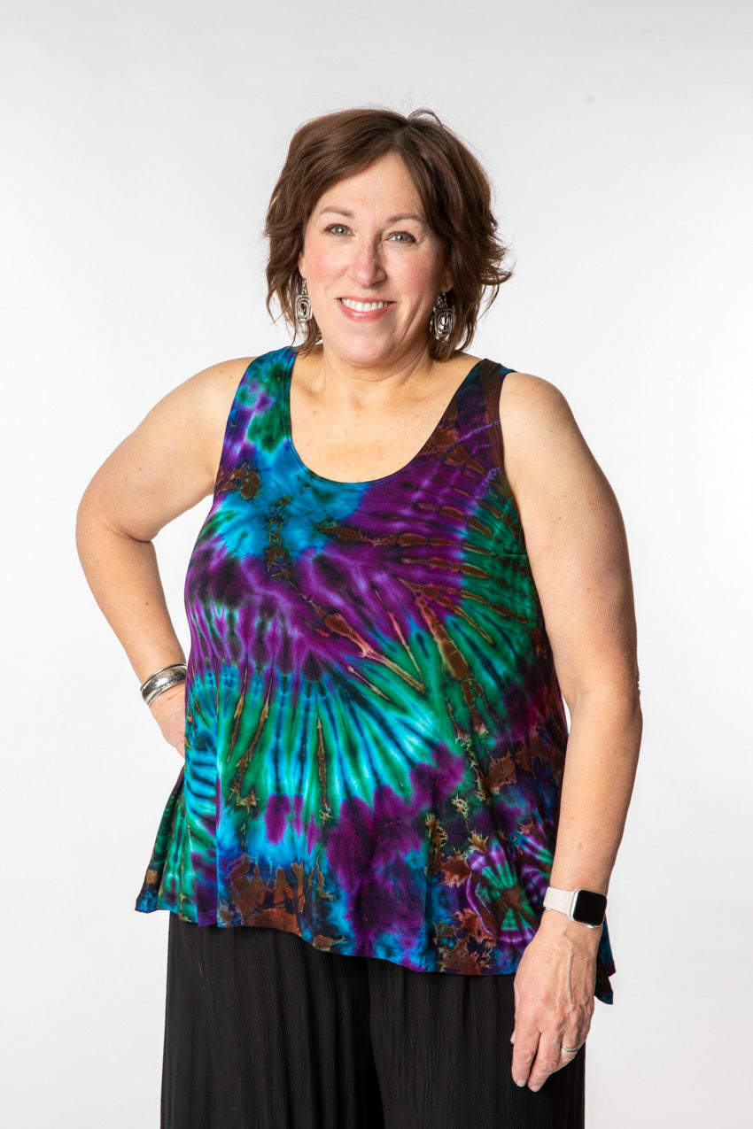 Betty is wearing a tie dye tank top in ocean