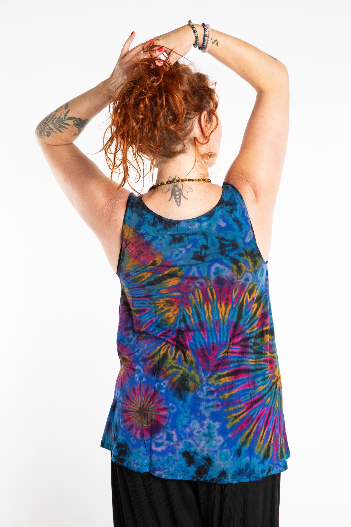 Maggie is wearing the Navy Ahana Tie Dye Tank Top