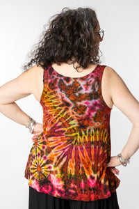 Susan is wearing a tie dye tank top in sunset