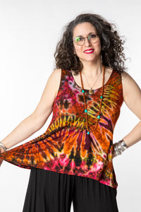 Susan is wearing a tie dye tank top in sunset