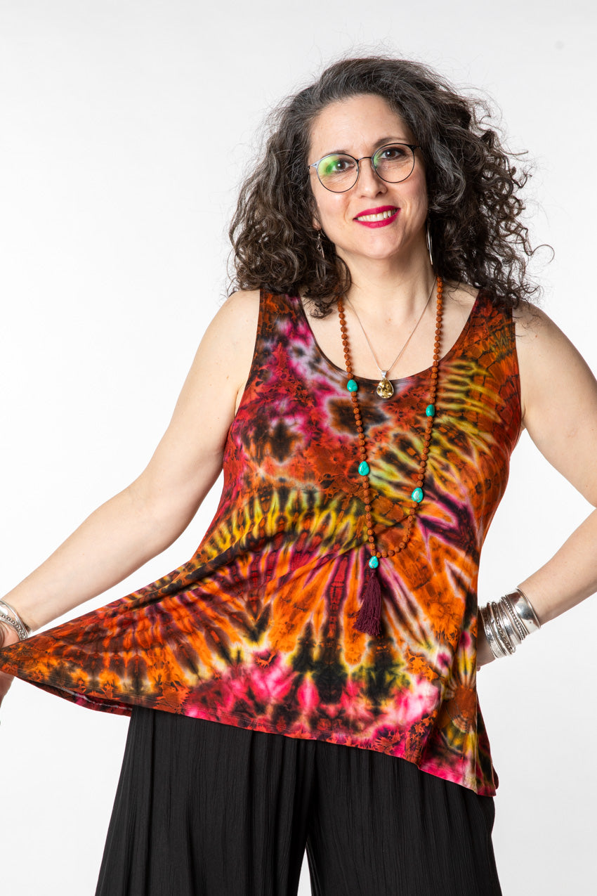 Susan is wearing a tie dye tank top in sunset