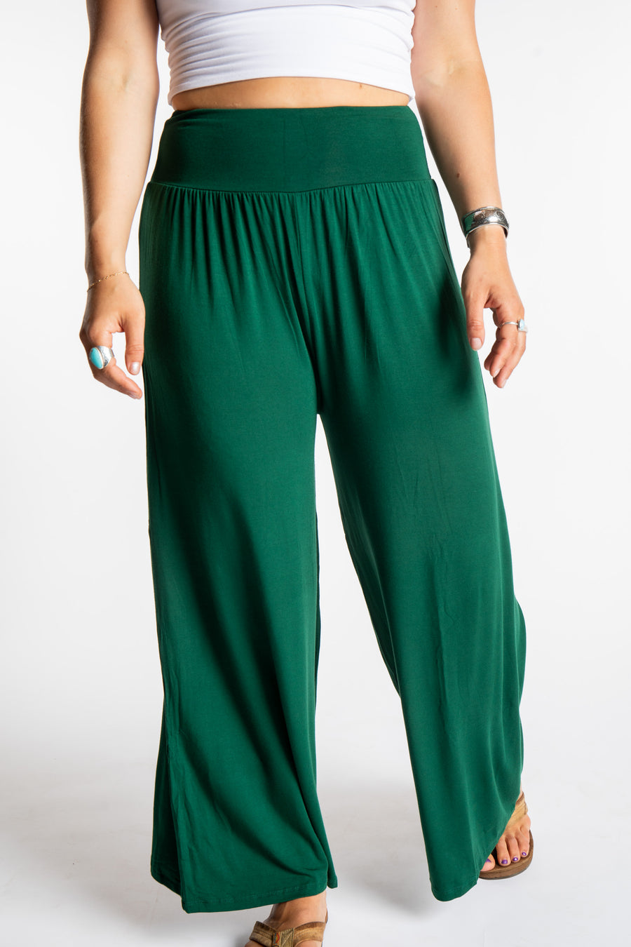 Sophie is wearing size S/M lounge pants in Green