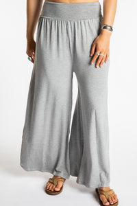 Sophie is wearing size S/M lounge pants in Light Gray