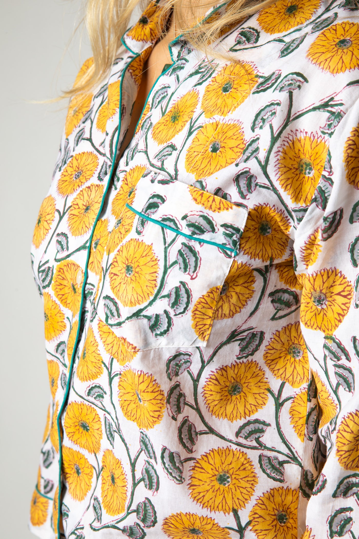 Sophie is wearing size M pajama set in dandelion