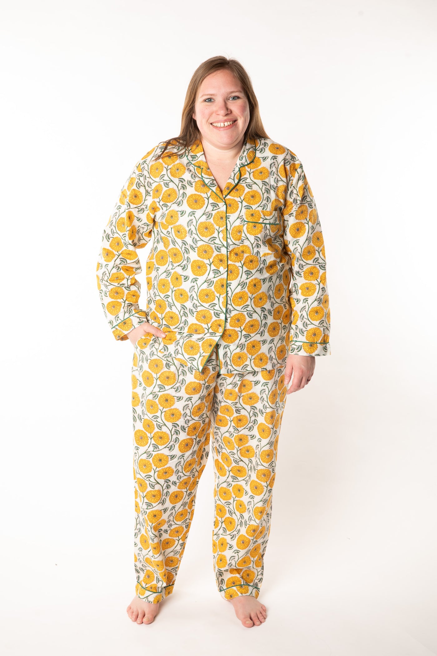 Olivia is wearing size XL pajama set in dandelion