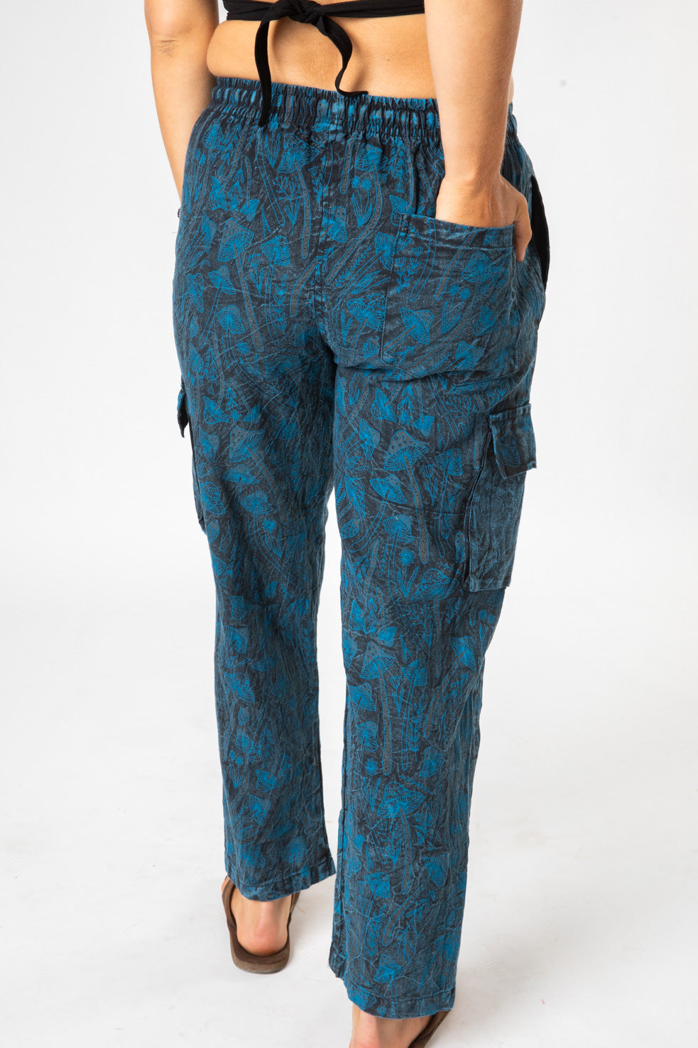 Sophie is wearing size S mushroom pants in blue