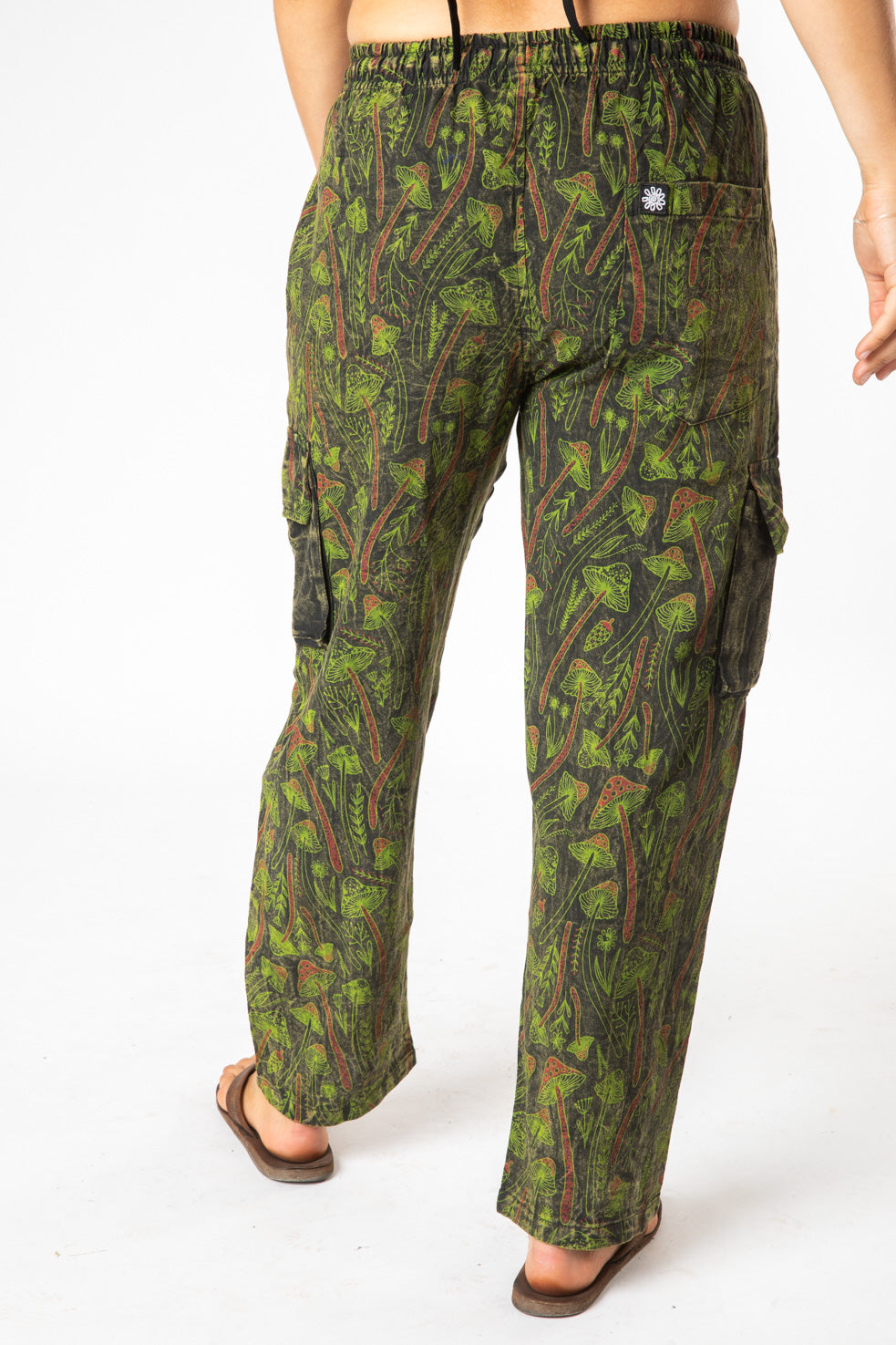 Sophie is wearing size S mushroom pants in green