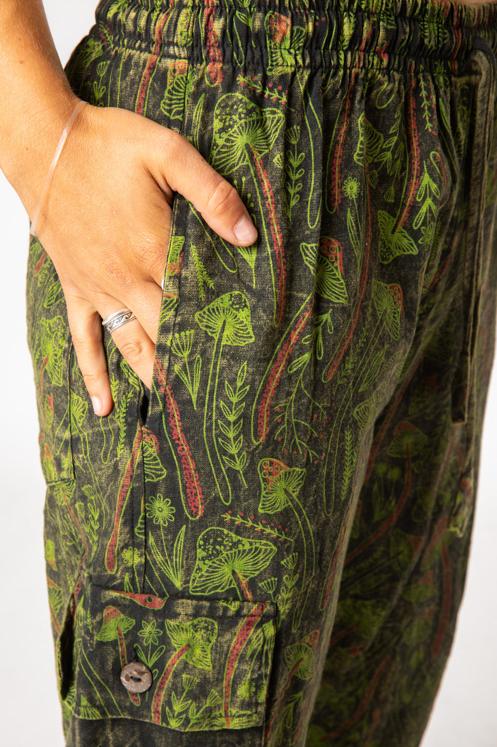 Sophie is wearing size S mushroom pants in green