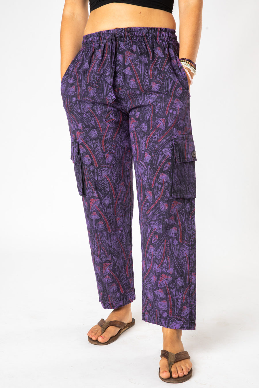 Sophie is wearing size S mushroom pants in purple