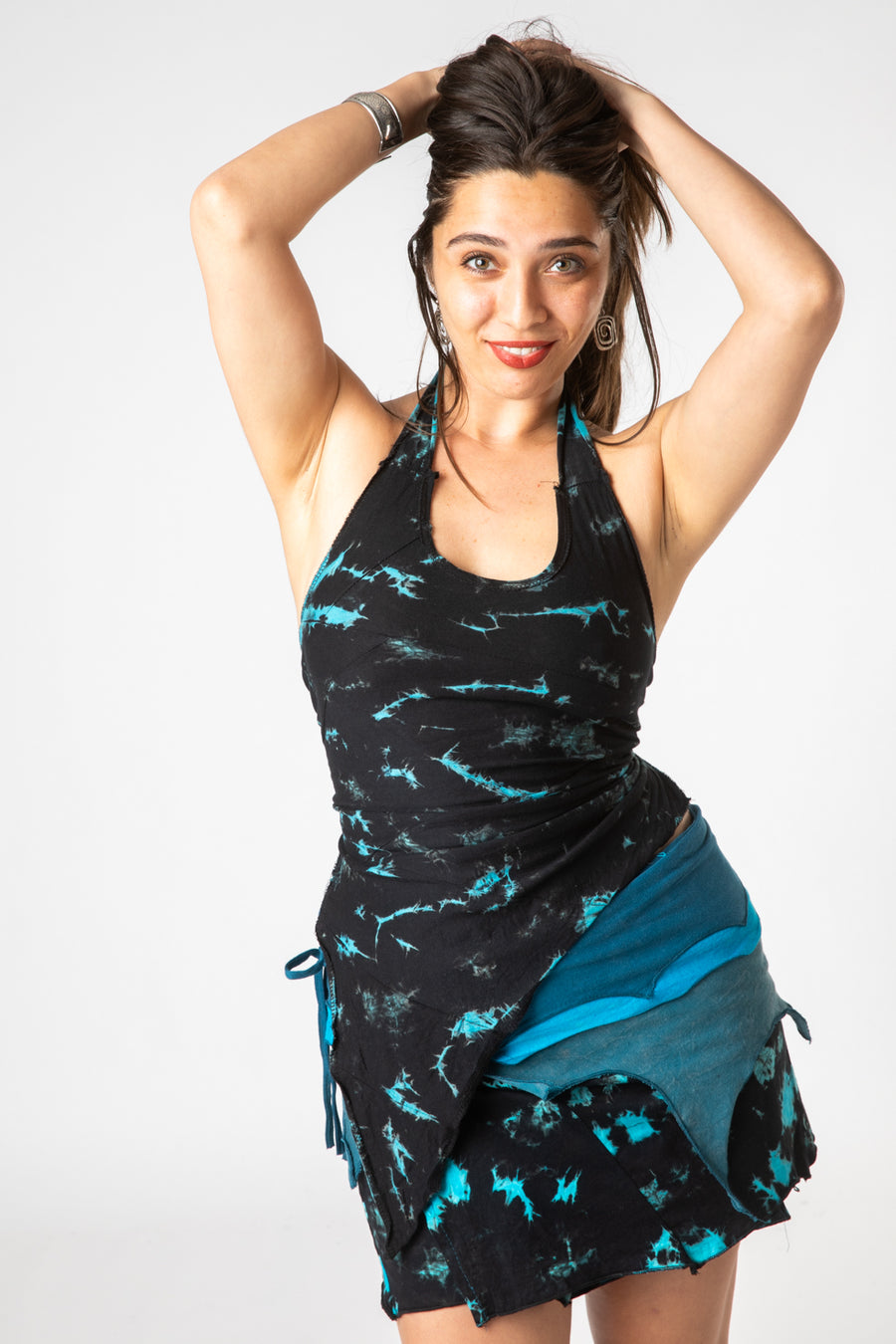 Gabrielle is wearing a tie dye wrap top in blue