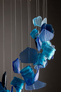 Spiral sea glass wind chime in blue