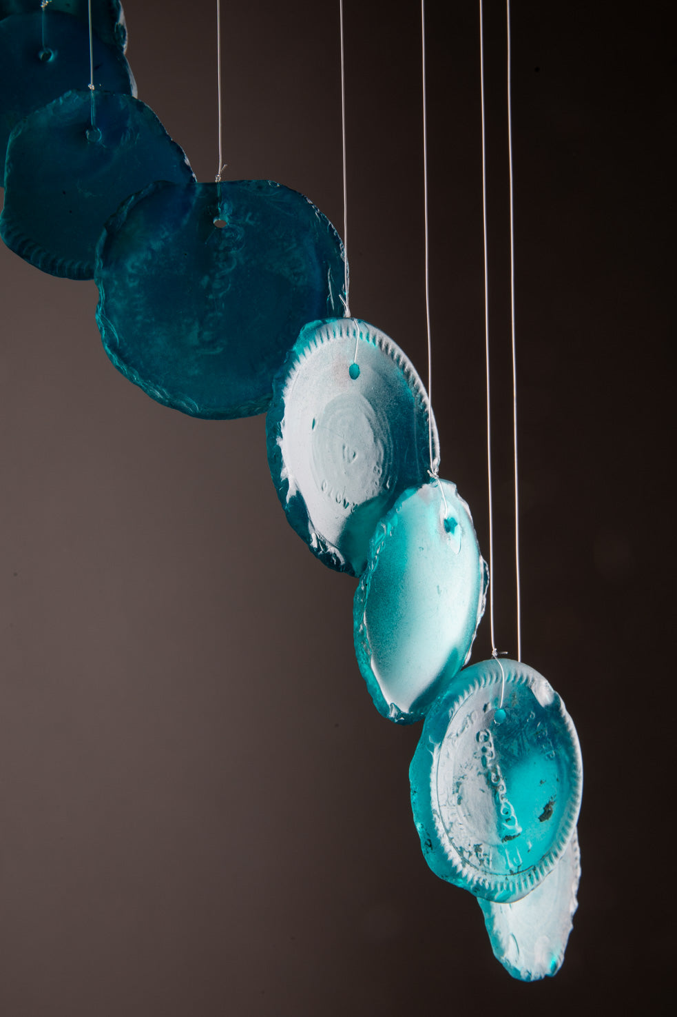 Spiraling sea glass wind chime in blue