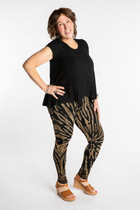 Betty is wearing the size M/L Black and White Tie Dye Leggings