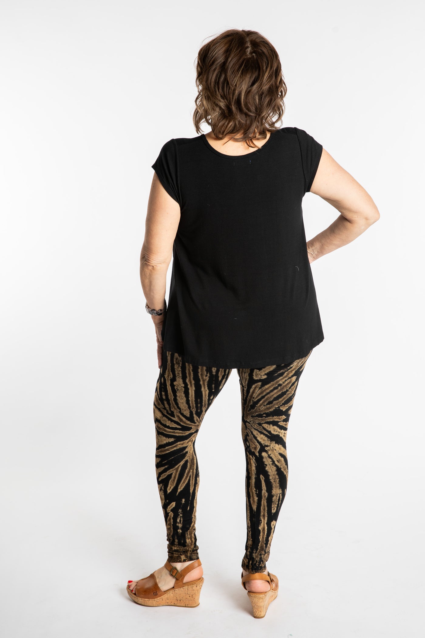 Betty is wearing the size M/L Black and White Tie Dye Leggings