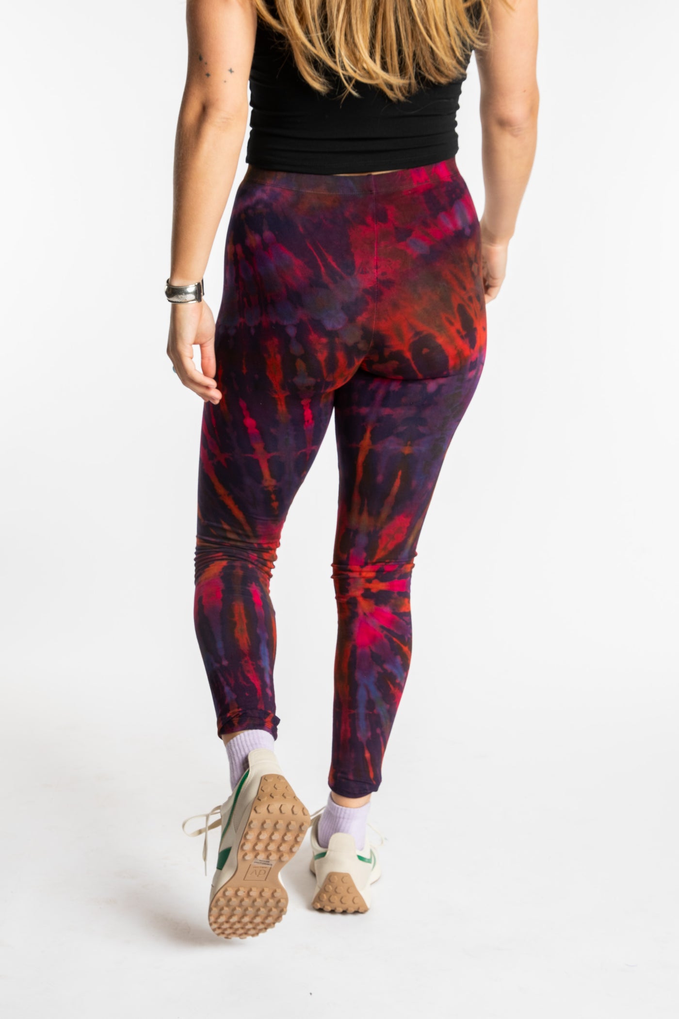 Sophie is wearing the size S/M Purple Eggplant Tie Dye Leggings