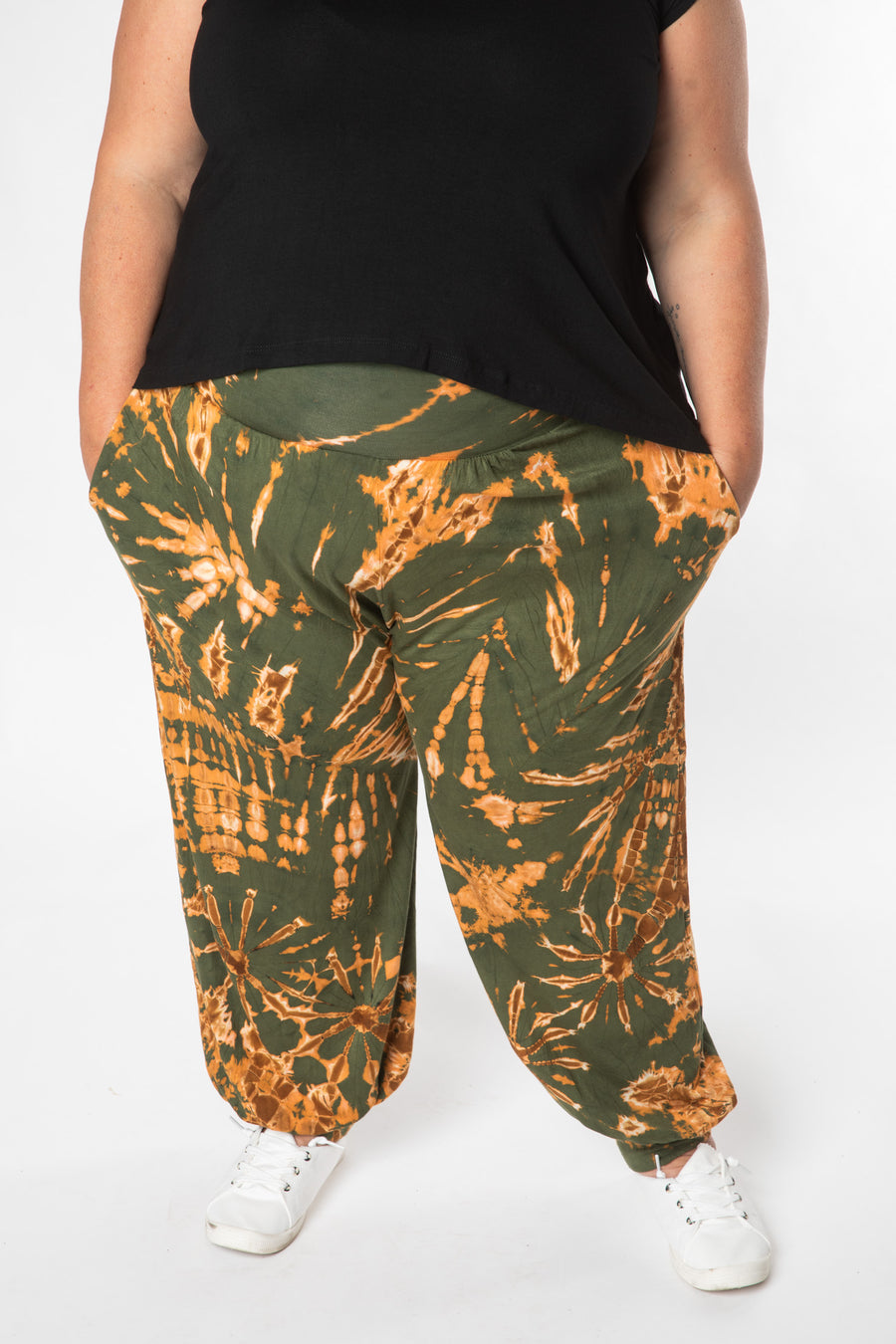 Angel is wearing size L/XL tie dye harem pants in green