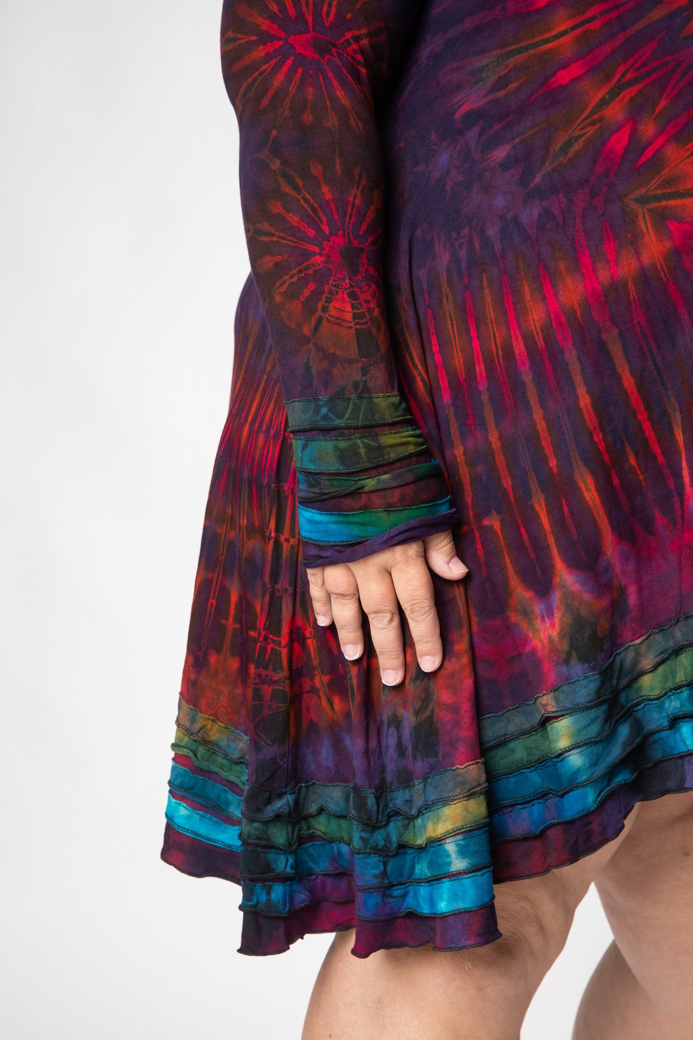 Angel is wearing long sleeve tie dye dress in eggplant