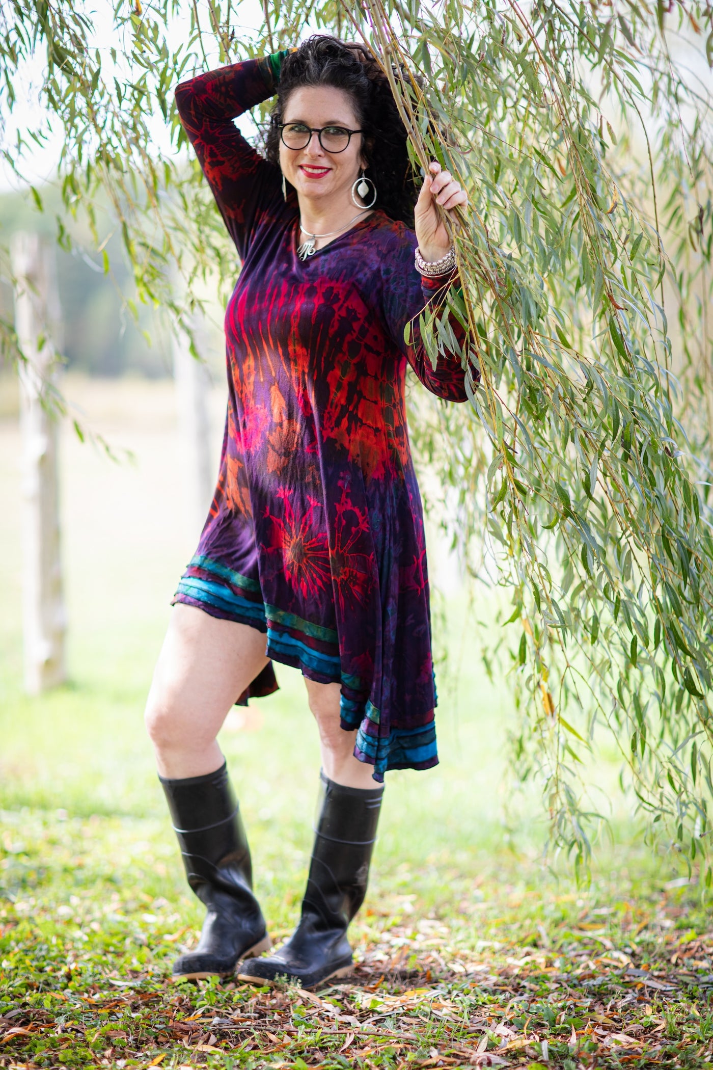 Susan is wearing long sleeve tie dye dress in eggplant