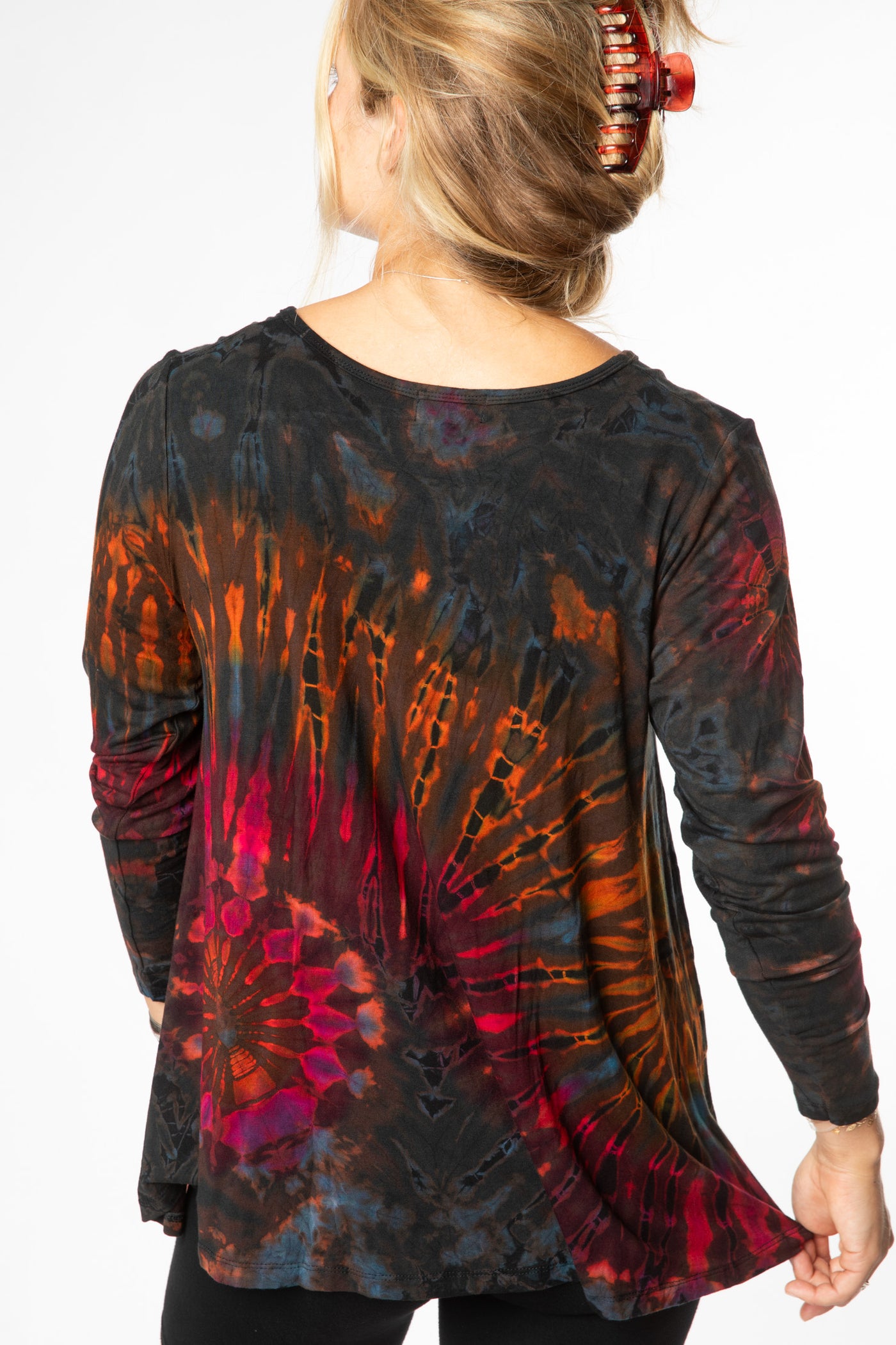 Sophie is wearing long sleeve tie dye top in brown