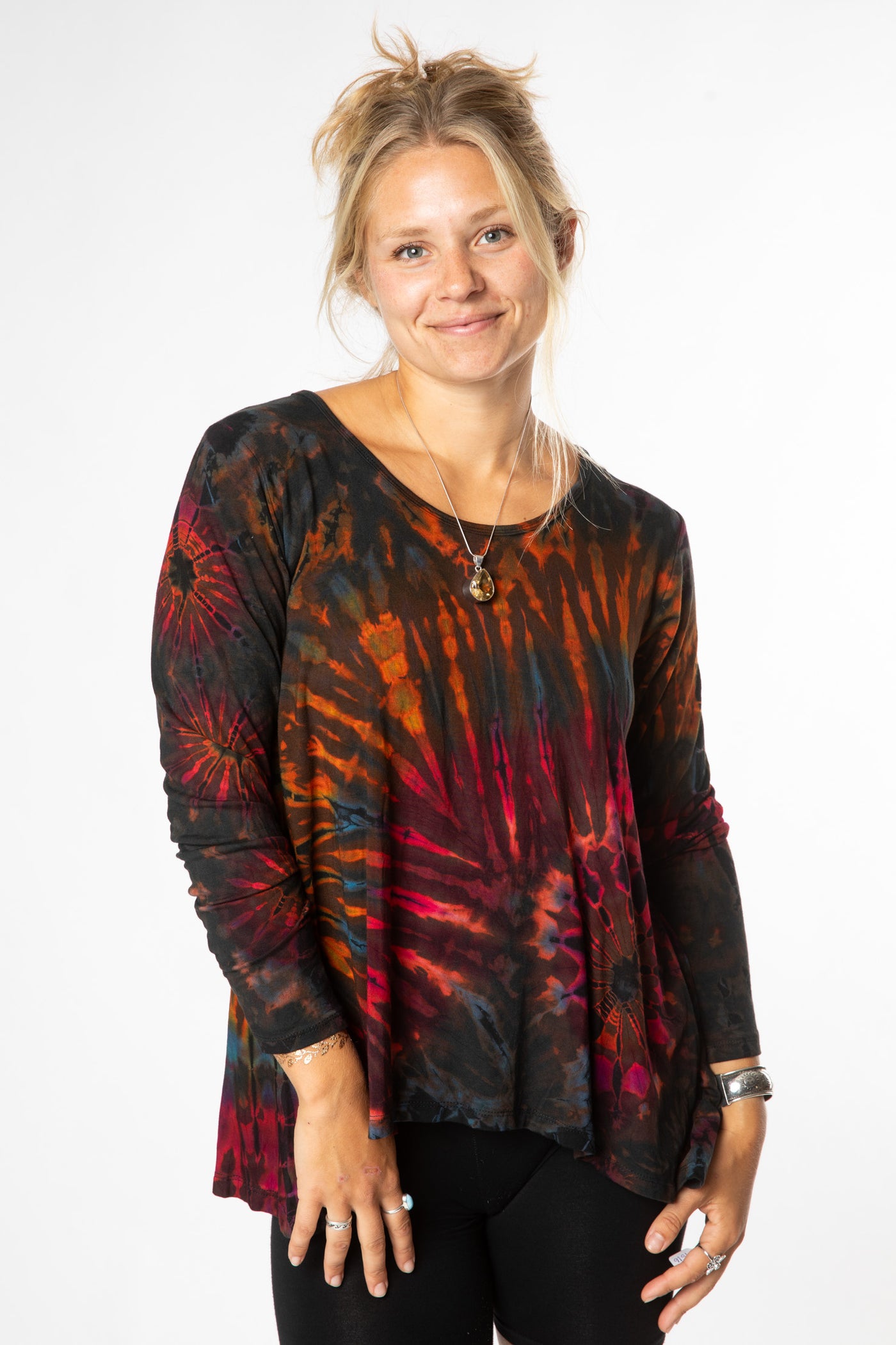 Sophie is wearing long sleeve tie dye top in brown