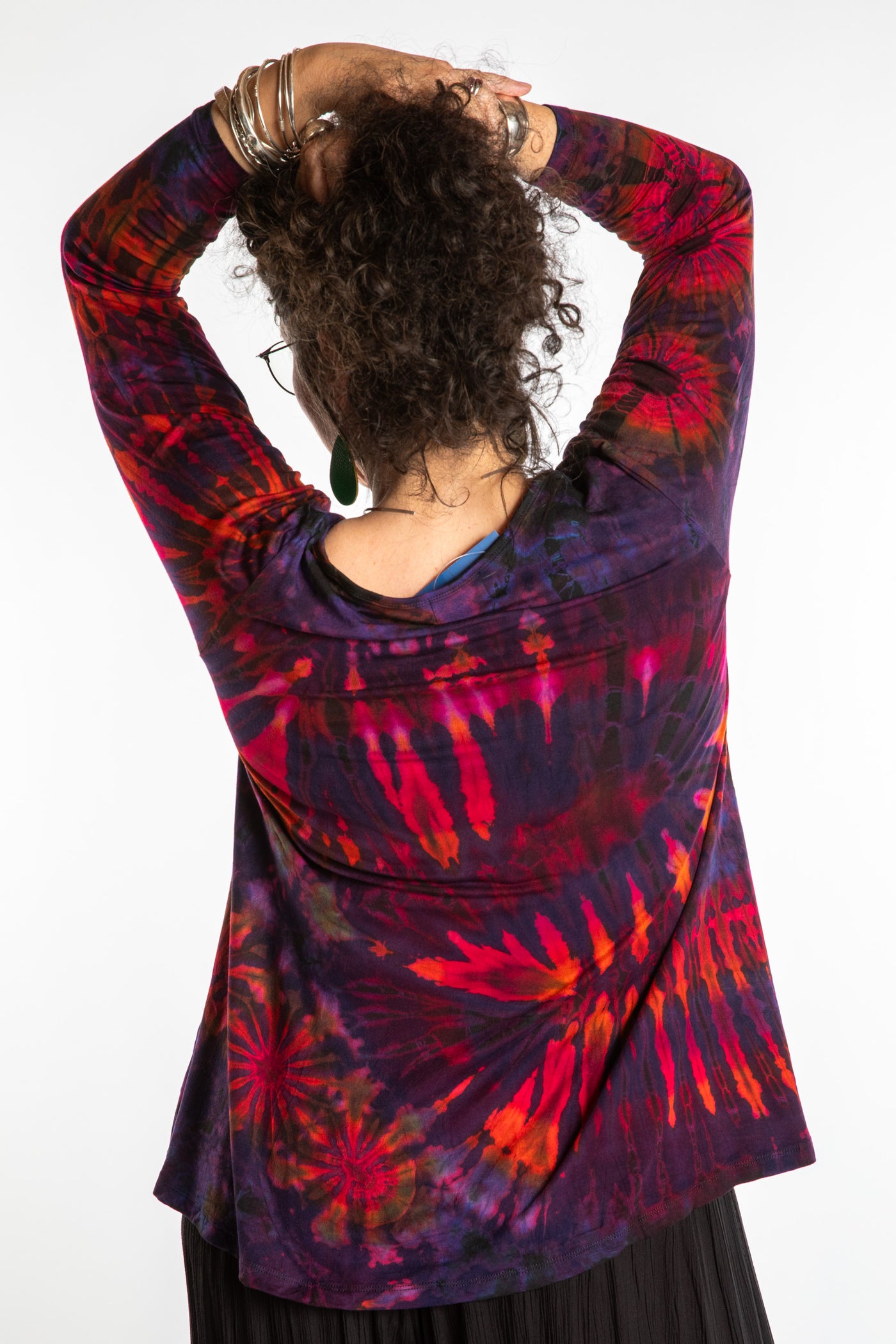 Susan wearing a purple long sleeve tie dye shirt in Eggplant