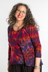 Susan wearing a purple long sleeve tie dye shirt in Eggplant