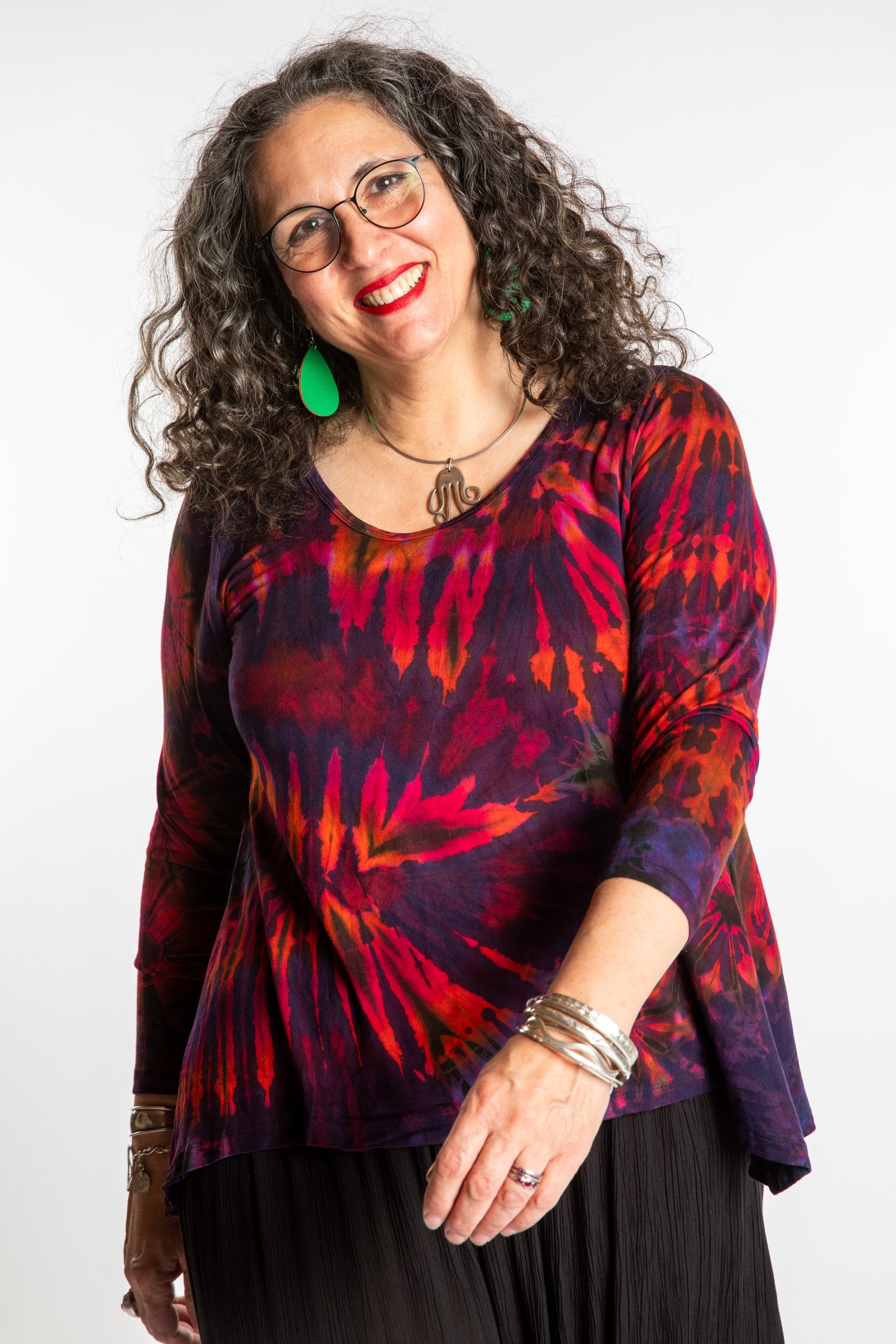 Susan wearing a purple long sleeve tie dye shirt in Eggplant