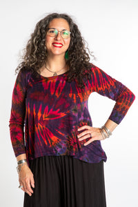 Susan wearing a purple long sleeve tie dye shirt in Eggplant