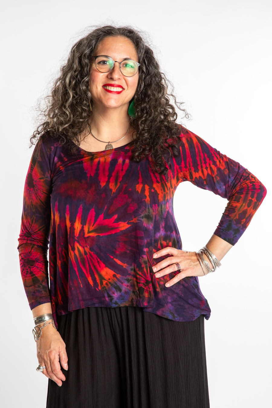 Susan wearing a purple long sleeve tie dye shirt in Eggplant