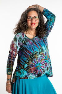 Susan wearing a blue long sleeve tie dye shirt in Ocean