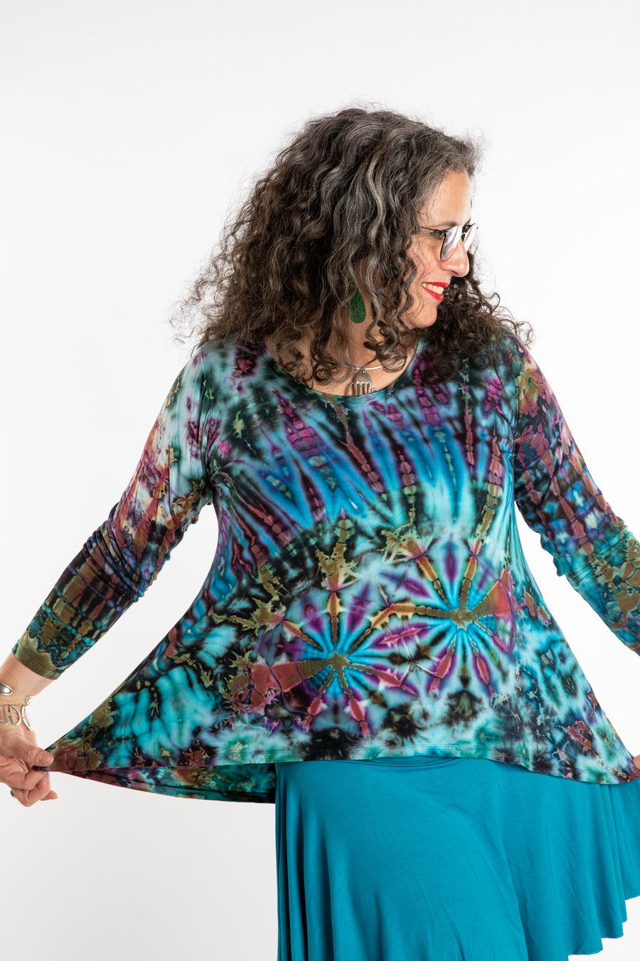 Susan wearing a blue tie dye shirt in Ocean