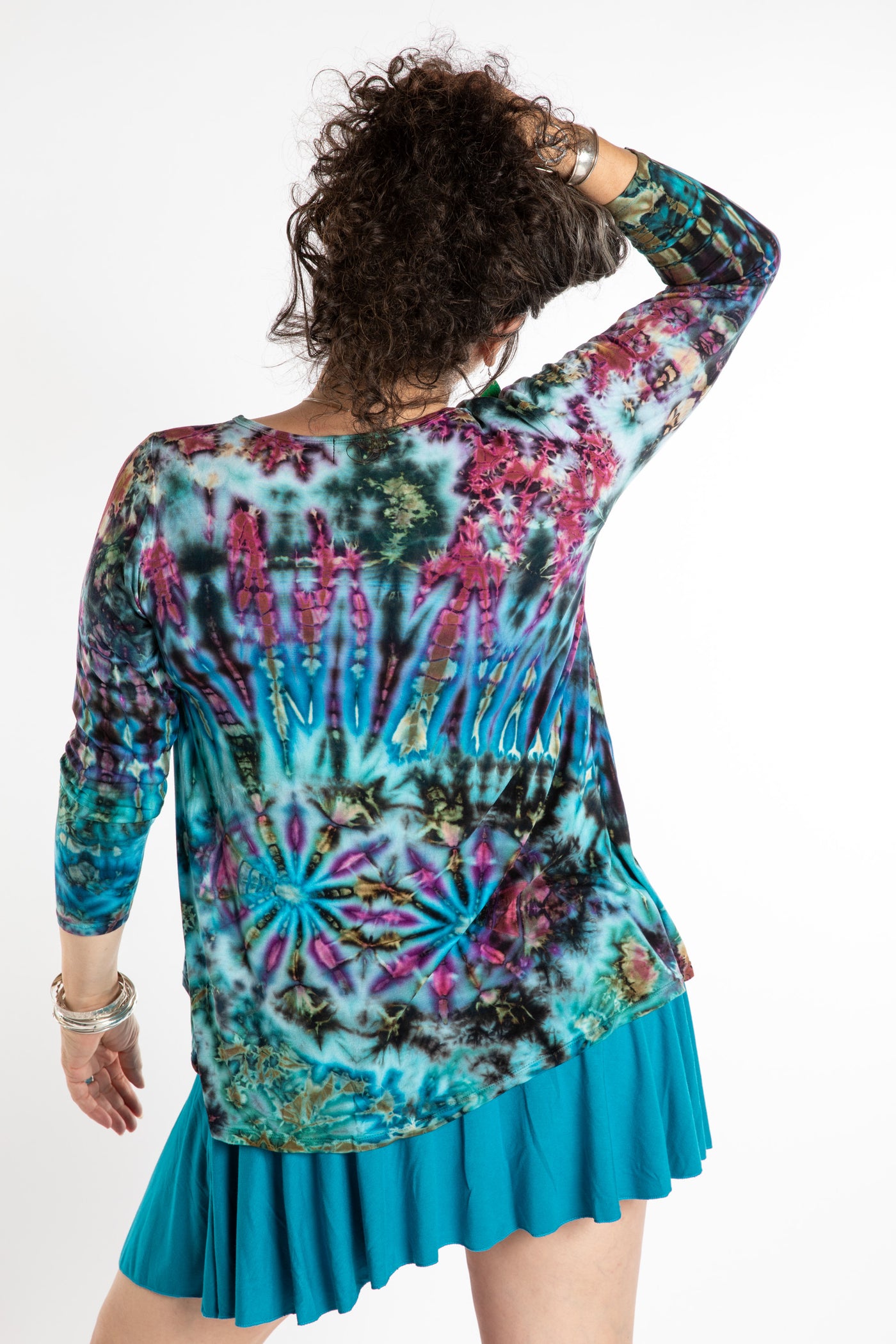 Susan wearing a blue long sleeve tie dye shirt in Ocean
