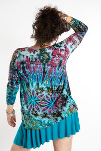 Susan wearing a blue long sleeve tie dye shirt in Ocean