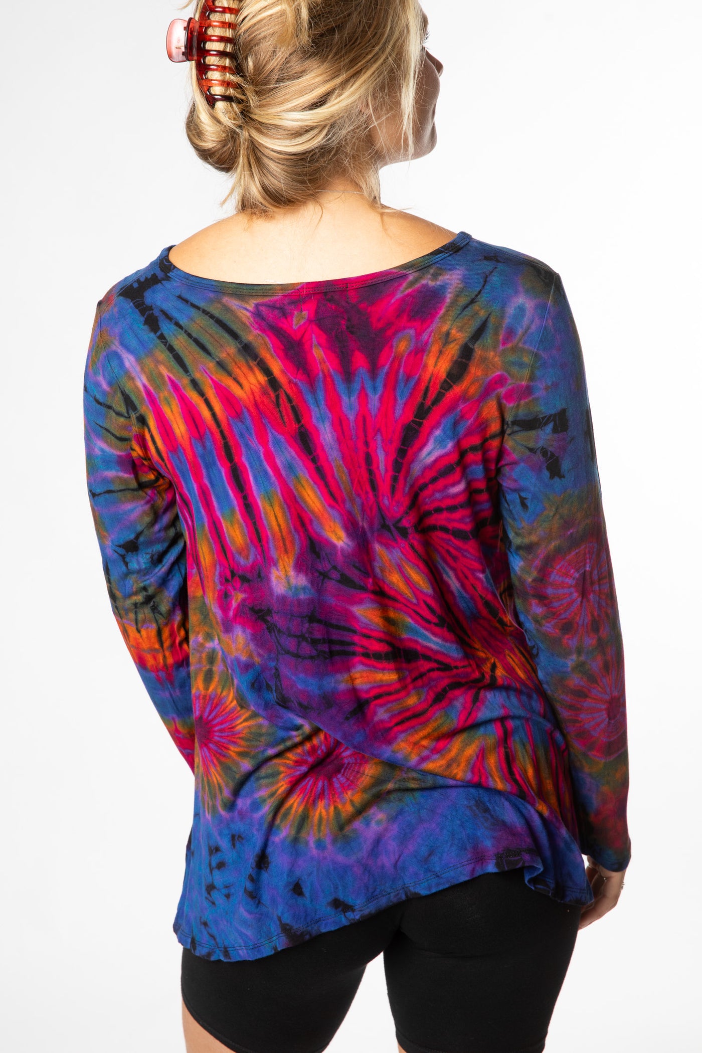 Sophie is wearing long sleeve tie dye top in purple