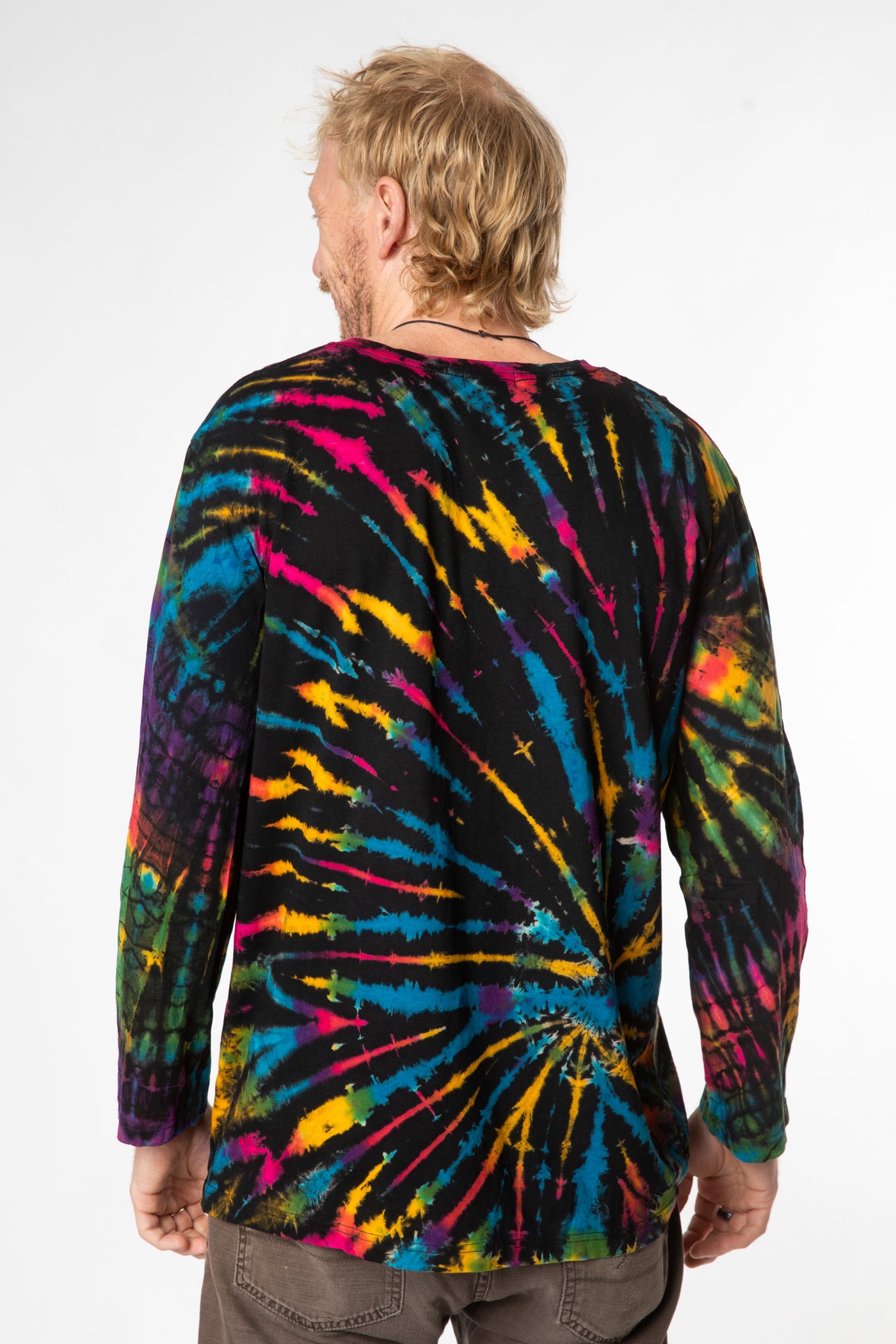 Chauncey is wearing size L long sleeve tie dye shirt in black rainbow