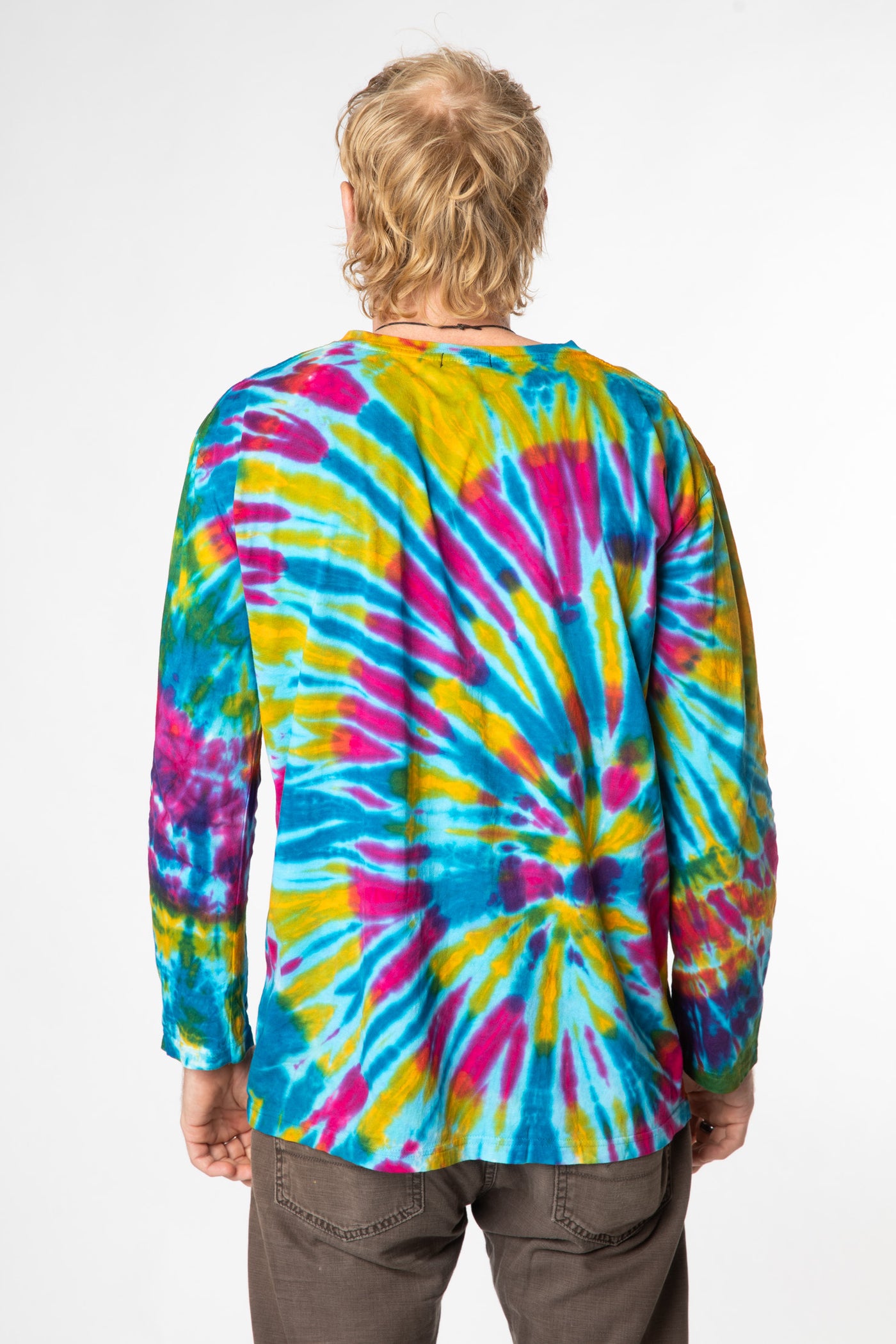 Chauncey is wearing size L long sleeve tie dye shirt in turquoise
