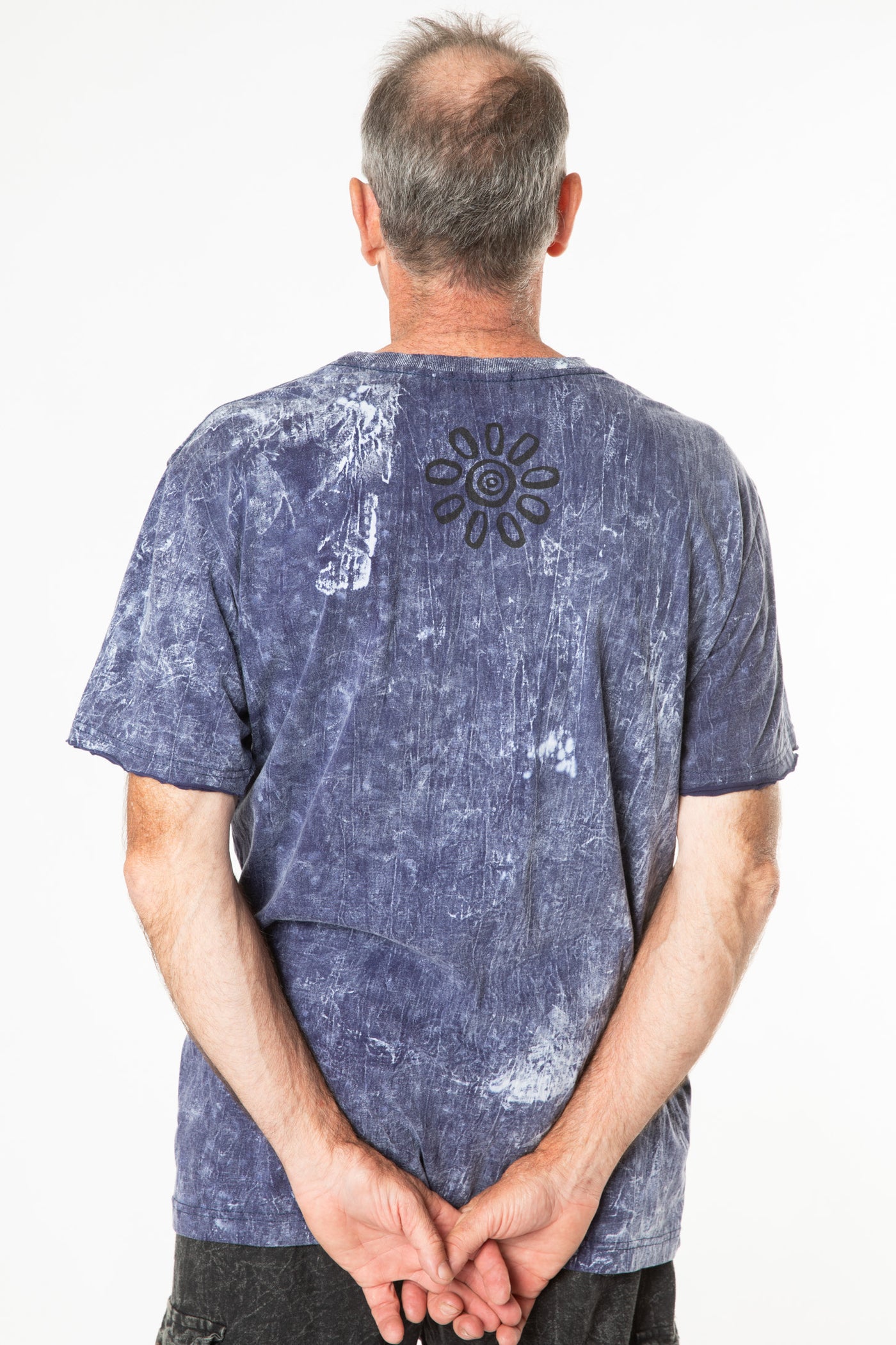 Ross is wearing size L stonewash t shirt in blue 