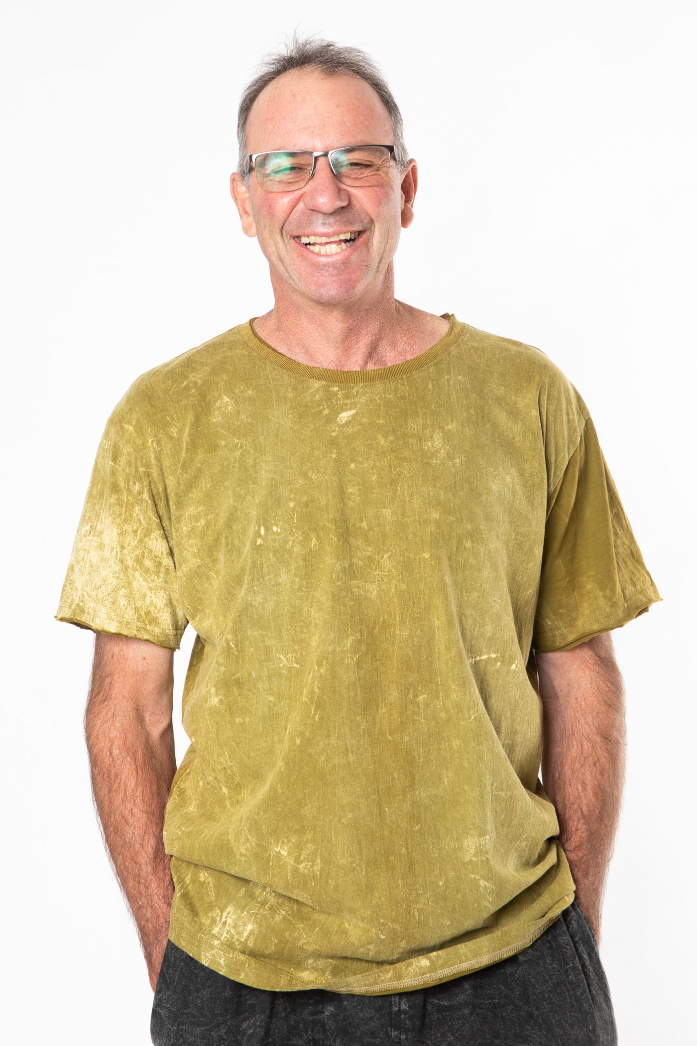 Ross is wearing size L stonewash t shirt in green 